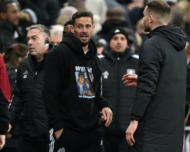 Jason Tindall, Assistant Manager of Newcastle United wears a 'Wham - Last Christmas' hoodie following the Premier League match between Newcastle United FC and Aston Villa FC at St James' Park on December 26, 2024 in Newcastle upon Tyne, England. (Photo by Stu Forster/Getty Images)