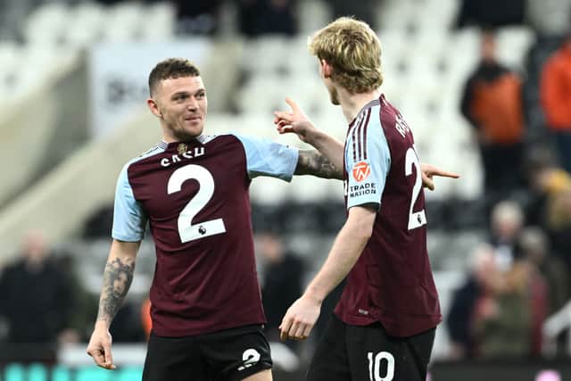 Kieran Trippier (l) and Anthony Gordon, both wearing Villa shirts, chat after the Premier League match between Newcastle United FC and Aston Villa FC at St James' Park on December 26, 2024 in Newcastle upon Tyne, England. (Photo by Stu Forster/Getty Images)