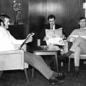 Ronnie Rutherford, Len Smith and Billy Thompson relax in the  hotel before the match.