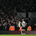Newcastle United's English midfielder #10 Anthony Gordon (C) celebrates scoring the team's second goal during the English League Cup semi-final first leg football match between Arsenal and Newcastle United at the Emirates Stadium, in London on January 7, 2025. (Photo by Glyn KIRK / AFP)