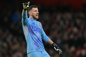 Newcastle United's Slovakian goalkeeper Martin Dubravka shouts instructions to the players during the English League Cup semi-final first leg football match between Arsenal and Newcastle United at the Emirates Stadium, in London on January 7, 2025. (Photo by Glyn KIRK / AFP) 