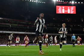 Alexander Isak celebrates scoring the opening goal during the English League Cup semi-final first leg football match between Arsenal and Newcastle United at the Emirates Stadium, in London on January 7, 2025. (Photo by Glyn KIRK / AFP) 
