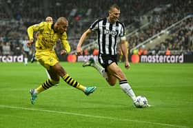 Donyell Malen in action for Borussia Dortmund against Newcastle United. Malen is on the verge of joining Aston Villa