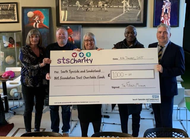 Maureen Summerill, Michael Ganley of the Fans Museum, Emma Scott, Directorate Manager Urology, Gary Bennett and Stuart McCracken, Clinical Director for Urology, with the cheque presented to the trust's charity.