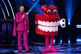 Fans think that Teeth could be Alan Carr or James Buckley.