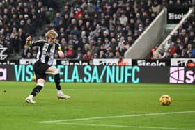 Anthony Gordon of Newcastle United scores his team's third goal during the Premier League match between Newcastle United FC and Wolverhampton Wanderers FC at St James' Park on January 15, 2025 in Newcastle upon Tyne, England. (Photo by Stu Forster/Getty Images)