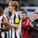 Newcastle United's English head coach Eddie Howe (R) applauds at the end of the English Premier League football match between Newcastle United and Bournemouth at St James' Park in Newcastle-upon-Tyne, north east England on January 18, 2025. Bournemouth wins 4 - 1 against Newcastle United. (Photo by Oli SCARFF / AFP)