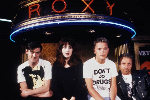 Stephen Morris, Gillian Gilbert, Bernard Sumner, and Peter Hook, of the band New Order, at the Roxy, London, 1986.