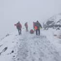 Injured man rescued from snow-covered mountain