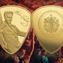 The gold plectrum coin is layered in pure 24-carat gold