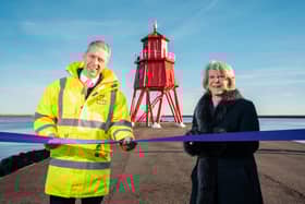 Matt Beeton, CEO of the Port of Tyne, and argaret Barbour DBE DL officially reopening the Herd Groyne, in South Shields, following its restoration work.