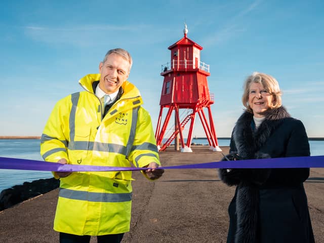 Matt Beeton, CEO of the Port of Tyne, and argaret Barbour DBE DL officially reopening the Herd Groyne, in South Shields, following its restoration work.
