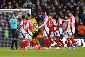 Myles Lewis-Skelly is sent off against Wolves.