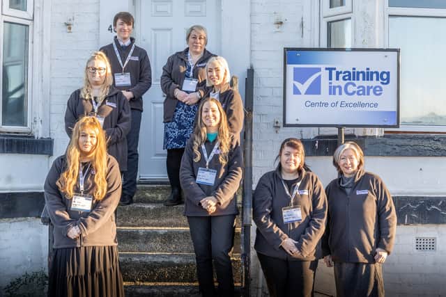 Dr Angela Brown (furthest right) with members of the Training in Care team outside of their head office, in South Shields.
