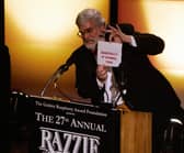 Presenter John Wilson announces the winner for  "Worst Picture",  "Basic Instinct 2" announced as "Basically it Stinks Too" during the Razzie Awards in Hollywood, CA, 24 February 2007.
