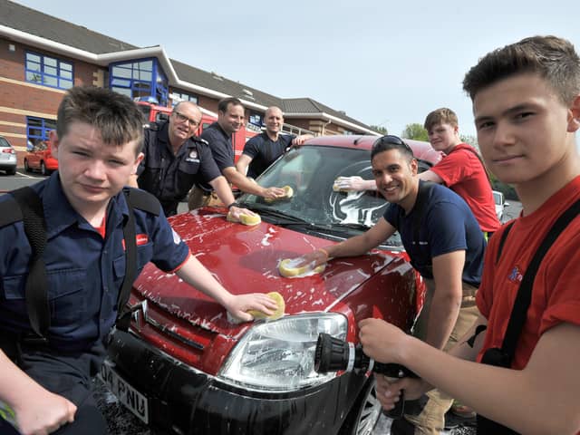 A wonderful day for these firefighters and young firefighters at their charity car wash day on John Reid Road in 2019.