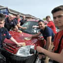 A wonderful day for these firefighters and young firefighters at their charity car wash day on John Reid Road in 2019.