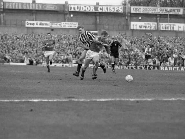 More action from the league clash in February 1990.