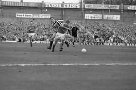 More action from the league clash in February 1990.