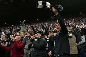 Newcastle Fans celebrate the first goal during the Carabao Cup Semi Final Second Leg match between Newcastle United and Arsenal at St James' Park on February 05, 2025 in Newcastle upon Tyne, England. (Photo by Stu Forster/Getty Images)