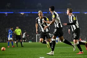 Joe Willock of Newcastle United celebrates scoring his team's first goal with teammates during the Emirates FA Cup Fourth Round match between Birmingham City and Newcastle United at St Andrewâs at Knighthead Park on February 08, 2025 in Birmingham, England. (Photo by Michael Regan/Getty Images)