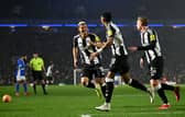 Joe Willock of Newcastle United celebrates scoring his team's first goal with teammates during the Emirates FA Cup Fourth Round match between Birmingham City and Newcastle United at St Andrewâs at Knighthead Park on February 08, 2025 in Birmingham, England. (Photo by Michael Regan/Getty Images)