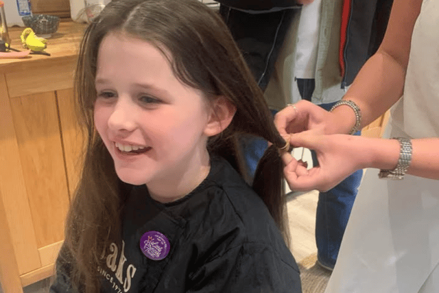 Cora had been growing her hair for two years so she could do the charity haircut.