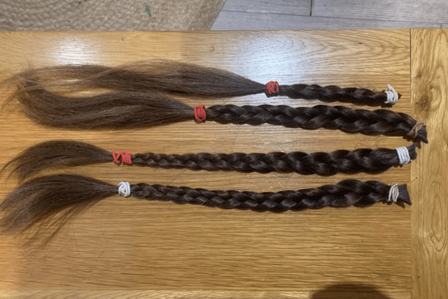 As well as donating her hair, Cora also raised around £300 in the process.