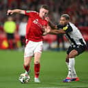 Elliot Anderson in action for Nottingham Forest against Newcastle United in the Carabao Cup.