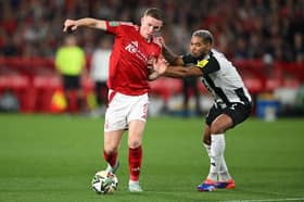 Elliot Anderson in action for Nottingham Forest against Newcastle United in the Carabao Cup.