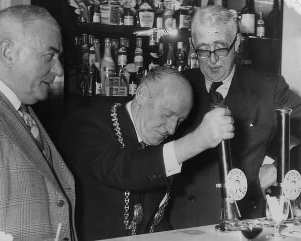 The Mayor of South Shields Ald S Jones was pictured pulling the first pint of beer at the opening of the Jolly Steward Hotel on the Marsden estate. 