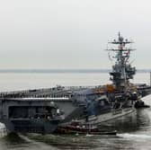 A fighter jet fell off the side of the American aircraft carrier USS Harry S. Truman while she was deployed in the Red Sea.