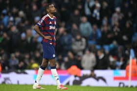 Newcastle United's Swedish striker #14 Alexander Isak reacts to conceding their fourth goal during the English Premier League football match between Manchester City and Newcastle United at the Etihad Stadium in Manchester, north west England, on February 15, 2025. (Photo by Oli SCARFF / AFP) / RESTRICTED TO EDITORIAL USE. No use with unauthorized audio, video, data, fixture lists, club/league logos or 'live' services. Online in-match use limited to 120 images. An additional 40 images may be used in extra time. No video emulation. Social media in-match use limited to 120 images. An additional 40 images may be used in extra time. No use in betting publications, games or single club/league/player publications. /  (Photo by OLI SCARFF/AFP via Getty Images)          