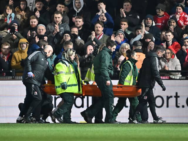 Nottingham Forest striker Taiwo Awoniyi was stretchered off against Exeter City in midweek