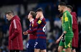 Lewis Miley of Newcastle United and his teammates look dejected after defeat in the Premier League match between Manchester City FC and Newcastle United FC at Etihad Stadium on February 15, 2025 in Manchester, England. (Photo by Stu Forster/Getty Images)
