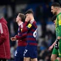 Lewis Miley of Newcastle United and his teammates look dejected after defeat in the Premier League match between Manchester City FC and Newcastle United FC at Etihad Stadium on February 15, 2025 in Manchester, England. (Photo by Stu Forster/Getty Images)