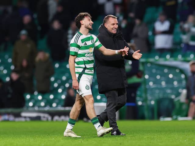 Celtic winger Nicolas Kuhn alongside Brendan Rodgers.