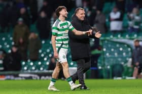 Celtic winger Nicolas Kuhn alongside Brendan Rodgers.