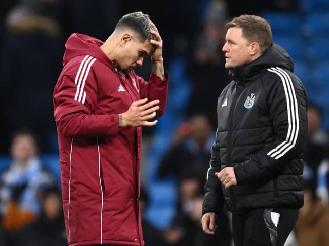 Bruno Guimaraes of Newcastle reacts as head coach Eddie Howe looks on after the Premier League match between Manchester City FC and Newcastle United FC at Etihad Stadium on February 15, 2025 in Manchester, England. (Photo by Stu Forster/Getty Images)
