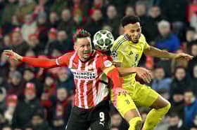 Lloyd Kelly in action for Juventus alongside PSV's Luuk De Jong