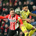 Lloyd Kelly in action for Juventus alongside PSV's Luuk De Jong