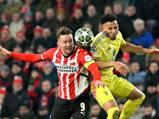 Lloyd Kelly in action for Juventus alongside PSV's Luuk De Jong