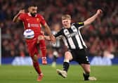 Lewis Hall in action for Newcastle United. 