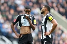 Alexander Isak (L) and Joelinton of Newcastle United react during the Emirates FA Cup Fifth Round match between Newcastle United and Brighton & Hove Albion at St James' Park on March 02, 2025 in Newcastle upon Tyne, England. (Photo by George Wood/Getty Images)