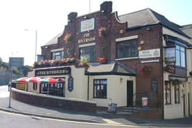 A look outside the pub in this sunny view from September 2003.