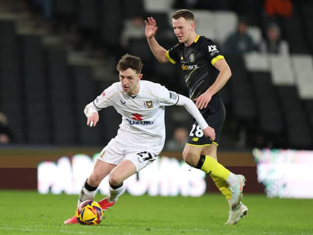 Joe White in action for MK Dons
