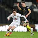 Joe White in action for MK Dons