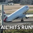 The tail of a plane hitting the ground while trying to land