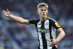 Newcastle United left-back Lewis Hall was not at Wembley Stadium on Sunday. 