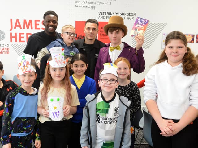 SAFC players Salis Abdul Samed and Enzo Le Fee visit the Beacon of Light for World Book Day.